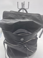 Black soft backpack with silver zipper