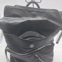 Black soft backpack with silver zipper