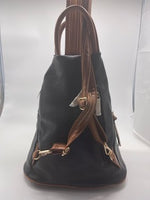 
              Black backpack with brown double straps
            