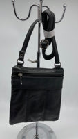 
              Black  Genuine leather  cross body handbag
            