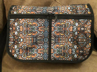 Top off your look and still manage to pack it all in with the Living My Blessed Life Crossbody Bag, featuring a design by Kiwi McDowell. Great for toting books and papers to school or office, going on a hike, or while running daily errands! The Living My Blessed Life Crossbody Bag is perfect for your on-the-go lifestyle!