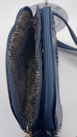 Denim blue mid-sized handbag with Alligator print