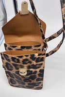 
              Leopard cross body handbag
            