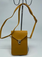 
              Mustard cross body handbag
            