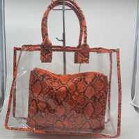 Clear tote with orange snakeskin bag
