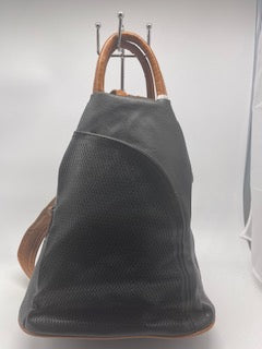 Black backpack with brown double straps